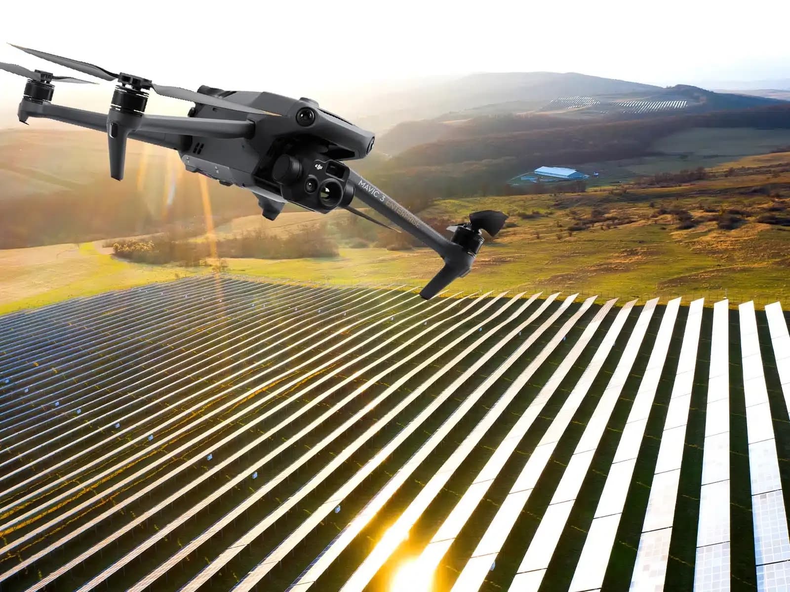 Composite of a drone above solar panel rows with hills in the background Composite of a drone above solar panel rows with hills in the background