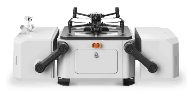 Drone resting on an open DJI Dock station